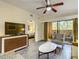 Living room with access to a private balcony and comfortable seating at 12544 Floridays Resort Dr # 202B, Orlando, FL 32821