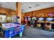 Fun game room with air hockey and arcade games at 12544 Floridays Resort Dr # 202B, Orlando, FL 32821