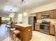 Well-equipped kitchen with stainless steel appliances at 12538 Floridays Resort Dr # C-211, Orlando, FL 32821