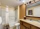 Bathroom with shower/tub combo, vanity, and toilet at 12538 Floridays Resort Dr # C-211, Orlando, FL 32821