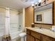 Bathroom with shower/tub combo, vanity, and toilet at 12538 Floridays Resort Dr # C-211, Orlando, FL 32821