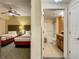 Cozy guest bedroom with twin beds and an ensuite bathroom at 12538 Floridays Resort Dr # C-211, Orlando, FL 32821
