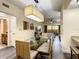 Spacious dining area with glass table and seating for six at 12538 Floridays Resort Dr # C-211, Orlando, FL 32821
