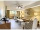 Living room with sofa, chairs, and access to patio at 12538 Floridays Resort Dr # C-211, Orlando, FL 32821