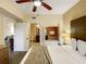 Bedroom with king-size bed and access to bathroom and jacuzzi at 12538 Floridays Resort Dr # C-211, Orlando, FL 32821