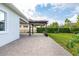 Enjoyable backyard patio with pergola and paver stones at 5012 E Fountainwood Dr, St Cloud, FL 34772