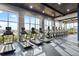 Modern gym with cardio equipment and natural light at 5012 E Fountainwood Dr, St Cloud, FL 34772