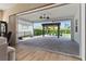 Inviting patio with pergola, brick pavers, and sliding glass doors at 5012 E Fountainwood Dr, St Cloud, FL 34772