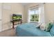 Guest bedroom with a double bed and window at 5012 E Fountainwood Dr, St Cloud, FL 34772