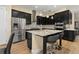 Modern kitchen with stainless steel appliances and island at 5012 E Fountainwood Dr, St Cloud, FL 34772
