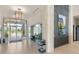 Modern community lobby with glass doors and artwork at 5012 E Fountainwood Dr, Saint Cloud, FL 34772