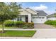 Charming Craftsman style home with beautiful landscaping at 5012 E Fountainwood Dr, St Cloud, FL 34772