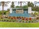Twin Lakes community entrance sign with fountain and landscaping at 5012 E Fountainwood Dr, St Cloud, FL 34772