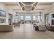 Spacious community clubhouse lobby with comfortable seating at 5012 E Fountainwood Dr, St Cloud, FL 34772