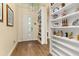 Light and airy entry hall with built-in shelving units at 5012 E Fountainwood Dr, St Cloud, FL 34772