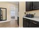 Home office with printer and built-in cabinets at 5012 E Fountainwood Dr, St Cloud, FL 34772