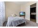 Cozy bedroom with a double bed and built-in closet at 5012 E Fountainwood Dr, St Cloud, FL 34772