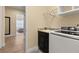 Laundry room with washer, dryer, and utility sink at 5012 E Fountainwood Dr, St Cloud, FL 34772