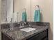 Bathroom vanity with granite countertop and sink at 5012 E Fountainwood Dr, St Cloud, FL 34772
