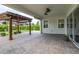 Spacious covered patio with pavers and pergola view at 5012 E Fountainwood Dr, Saint Cloud, FL 34772