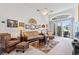 Spacious living room with comfy wicker furniture at 220 Lewis Dr, Davenport, FL 33837