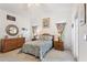 Comfortable bedroom with wooden furniture and soft bedding at 220 Lewis Dr, Davenport, FL 33837