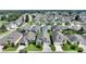 Large community with houses, streets, and green spaces at 220 Lewis Dr, Davenport, FL 33837