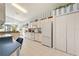 Kitchen with granite counters, white cabinets, and appliances at 220 Lewis Dr, Davenport, FL 33837