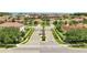 Gated community entrance with landscaping at 2891 Swoop Cir, Kissimmee, FL 34741