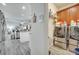 Laundry room with washer, dryer, and ample storage at 2891 Swoop Cir, Kissimmee, FL 34741