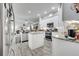 Island kitchen with granite countertops and stainless steel appliances at 2891 Swoop Cir, Kissimmee, FL 34741