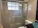 Bathroom with shower/tub combo and updated vanity at 109 N Palm Ave, Kissimmee, FL 34741