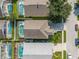 Overhead view of house with backyard and neighborhood context at 4384 Creekside Blvd, Kissimmee, FL 34746