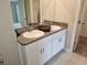 Double vanity bathroom with granite countertops at 1629 Yellow Trl, Lakeland, FL 33801
