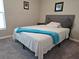 Bright bedroom with gray carpet and window at 1629 Yellow Trl, Lakeland, FL 33801