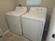 Laundry room with white washer and dryer set at 1629 Yellow Trl, Lakeland, FL 33801