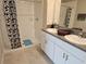 Bathroom with shower and double vanity at 1629 Yellow Trl, Lakeland, FL 33801