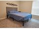 Bedroom with gray carpet and window at 1629 Yellow Trl, Lakeland, FL 33801