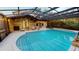 Relaxing screened pool and patio area with plenty of seating at 4251 Willow Bay Dr, Winter Garden, FL 34787