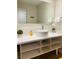 Sleek bathroom vanity with ample storage and a round vessel sink at 5245 W Irlo Bronson Memorial Hwy # 234, Kissimmee, FL 34746