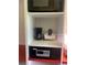 Compact kitchenette with microwave, coffee maker, and safe at 5245 W Irlo Bronson Memorial Hwy # 234, Kissimmee, FL 34746
