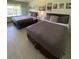 Spacious bedroom with two queen beds and wall art at 5245 W Irlo Bronson Memorial Hwy # 234, Kissimmee, FL 34746