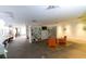 Spacious common area with comfortable seating and bookshelves at 5245 W Irlo Bronson Memorial Hwy # 234, Kissimmee, FL 34746