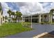 Exterior view showing building and grassy courtyard at 5245 W Irlo Bronson Memorial Hwy # 234, Kissimmee, FL 34746