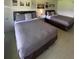 Spacious bedroom with two queen beds and wall art at 5245 W Irlo Bronson Memorial Hwy # 234, Kissimmee, FL 34746