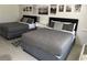 Bright bedroom featuring two double beds and modern decor at 5245 W Irlo Bronson Memorial Hwy # 234, Kissimmee, FL 34746