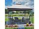 Designated smoking area with gazebo and comfortable seating at 5245 W Irlo Bronson Memorial Hwy # 234, Kissimmee, FL 34746