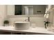 Modern bathroom vanity with vessel sink, mirror, and stylish decor at 5245 W Irlo Bronson Memorial Hwy # 234, Kissimmee, FL 34746