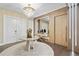 Stunning entryway featuring a statement chandelier and wood wall accents at 15620 Panther Lake Dr, Winter Garden, FL 34787