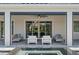 Relaxing covered patio with pool access at 15620 Panther Lake Dr, Winter Garden, FL 34787